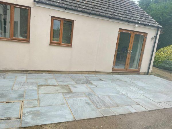 Limestone patio in Eight Ash Green