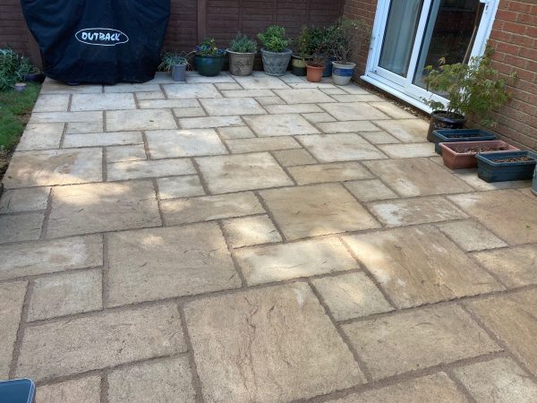 Riven slabbed patio installation in Alresford